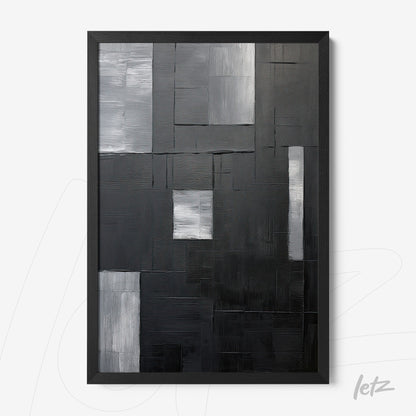 abstract wall art in black and white featuring geometric shapes with varied textures, black frame
