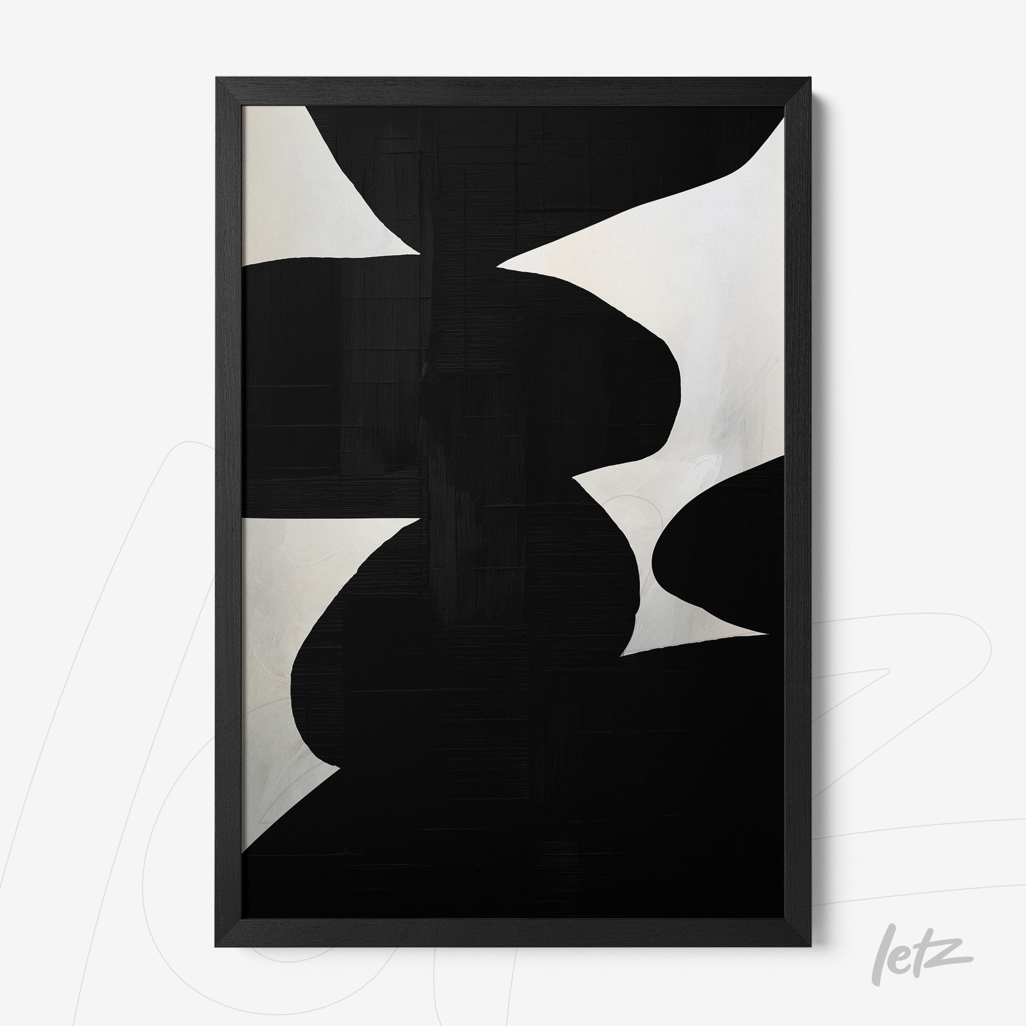 abstract wall art in black and white featuring organic shapes with a black frame