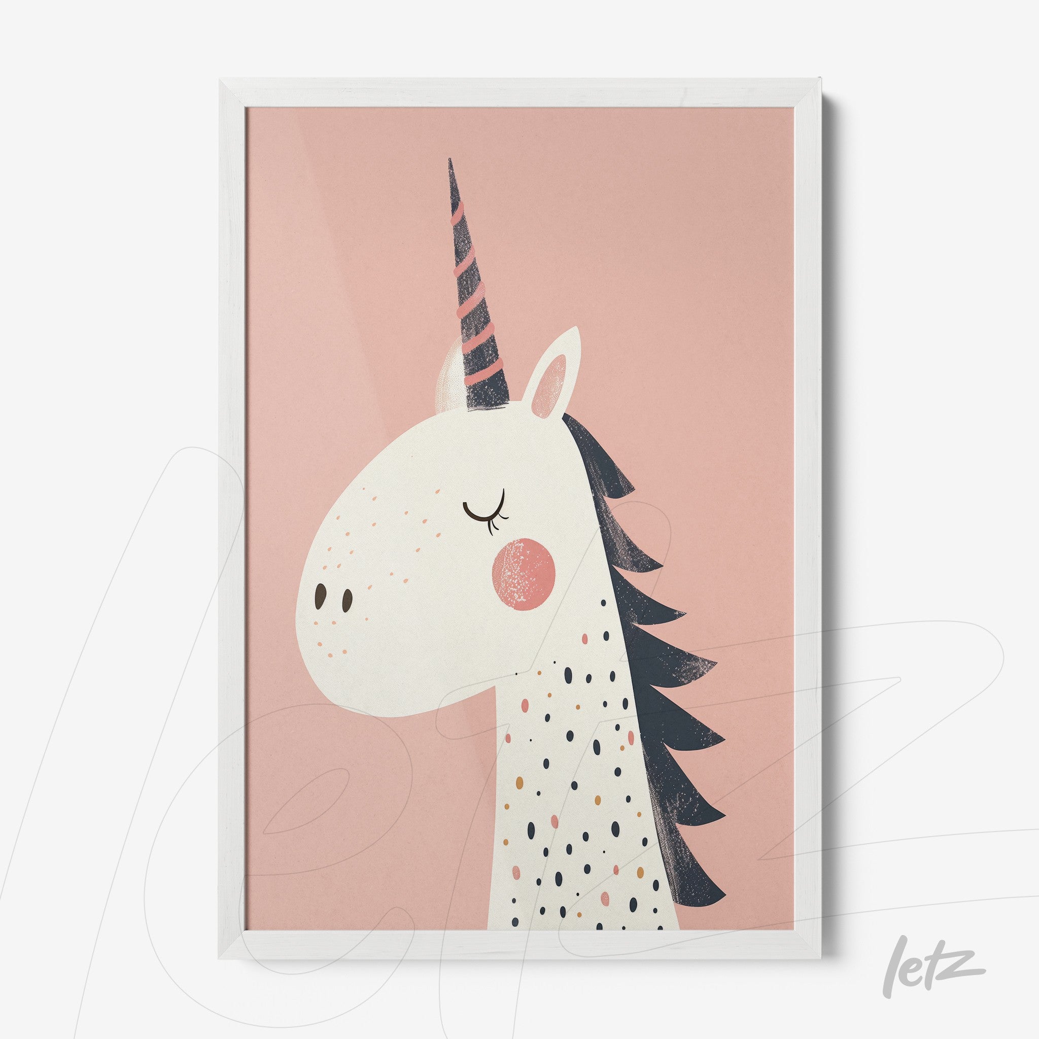 framed wall art featuring a unicorn illustration against a soft pink background with colorful dots