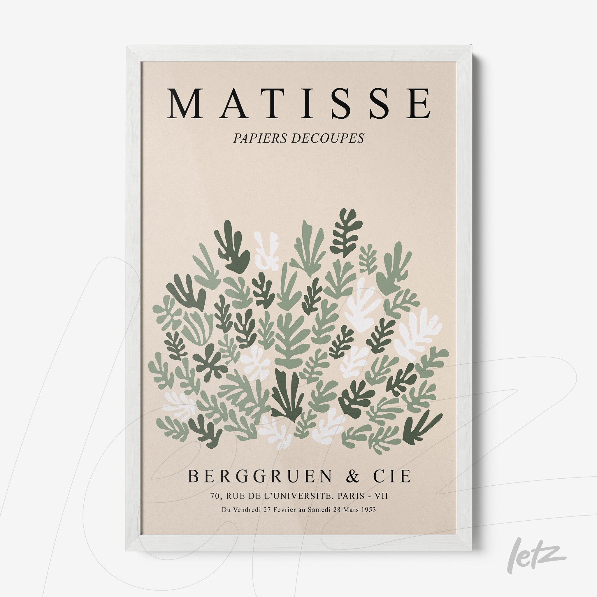 framed modern art print featuring leaves on a beige background with a white frame
