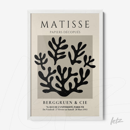 framed artwork featuring modern cut-out foliage design with a white frame