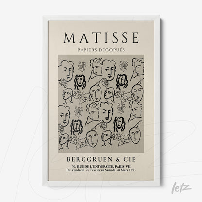 framed artwork by Henri Matisse featuring stylized faces in a white frame