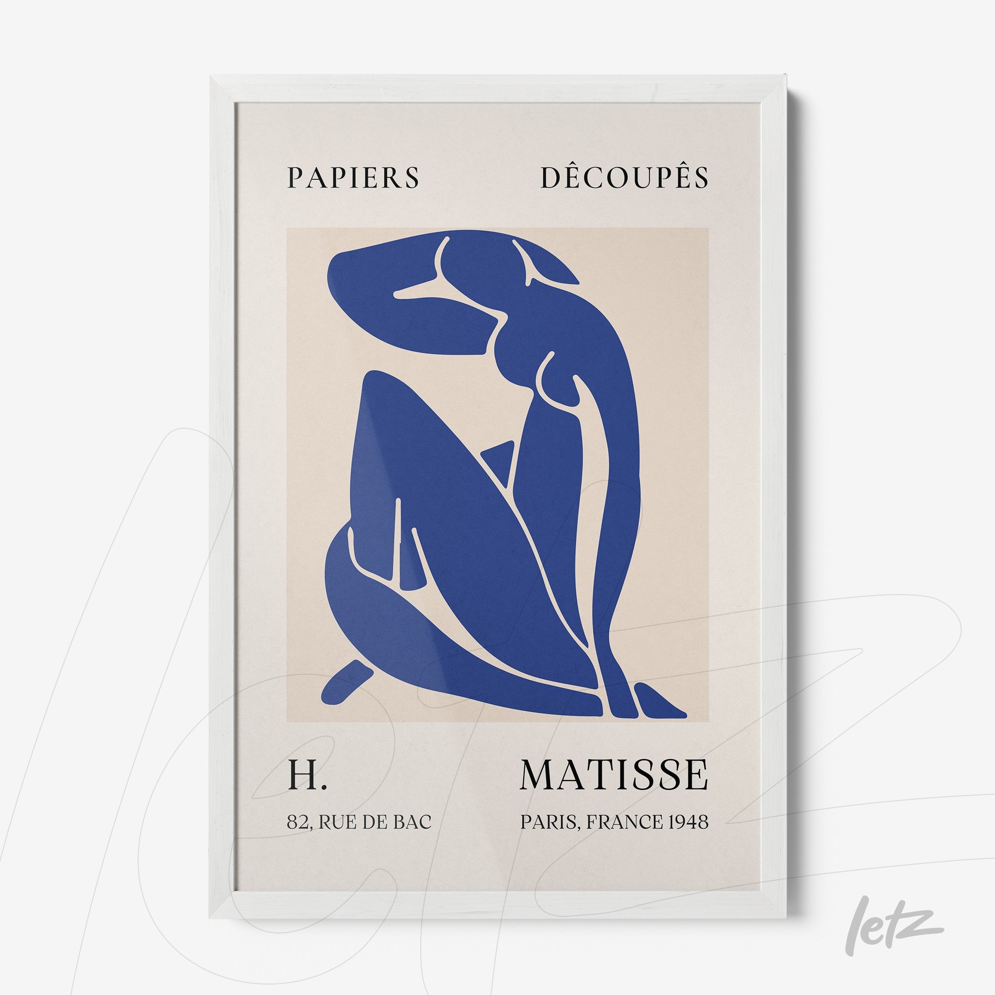 framed wall art featuring a blue cut-out figure in Matisse style with white frame