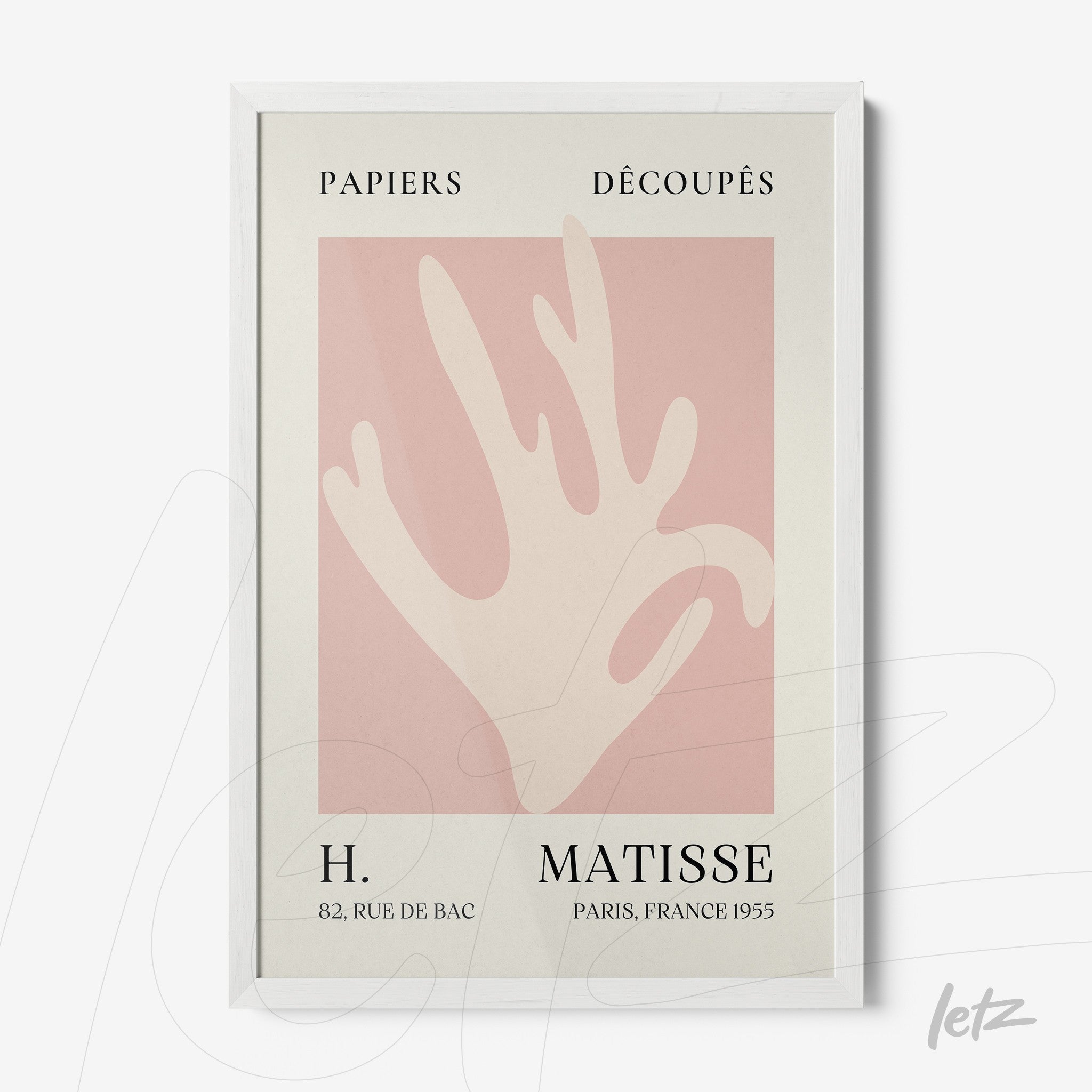 framed modern artwork featuring hands in shades of pink and cream, light background with black lettering