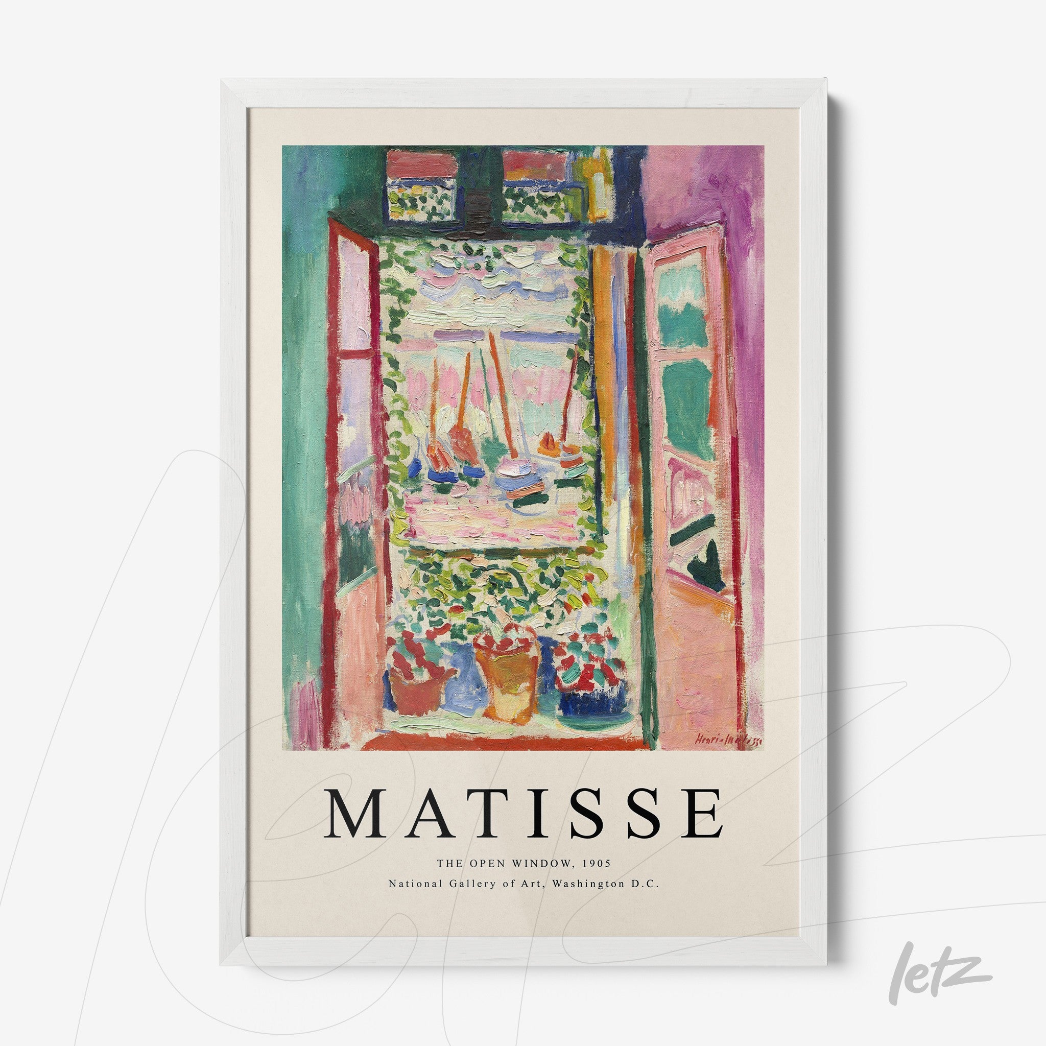 framed artwork by Henri Matisse depicting an open window with a view of a flower garden in a white frame