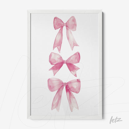 framed artwork featuring three watercolor pink bows with a white background