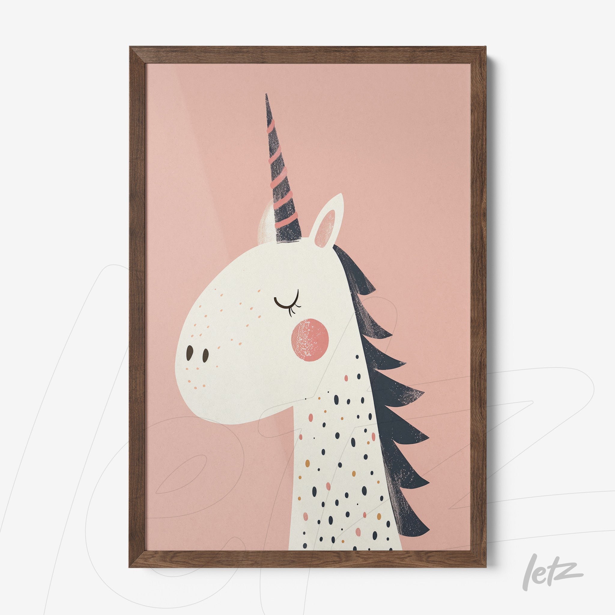 framed wall art featuring a unicorn illustration on a pink background with dark wood frame