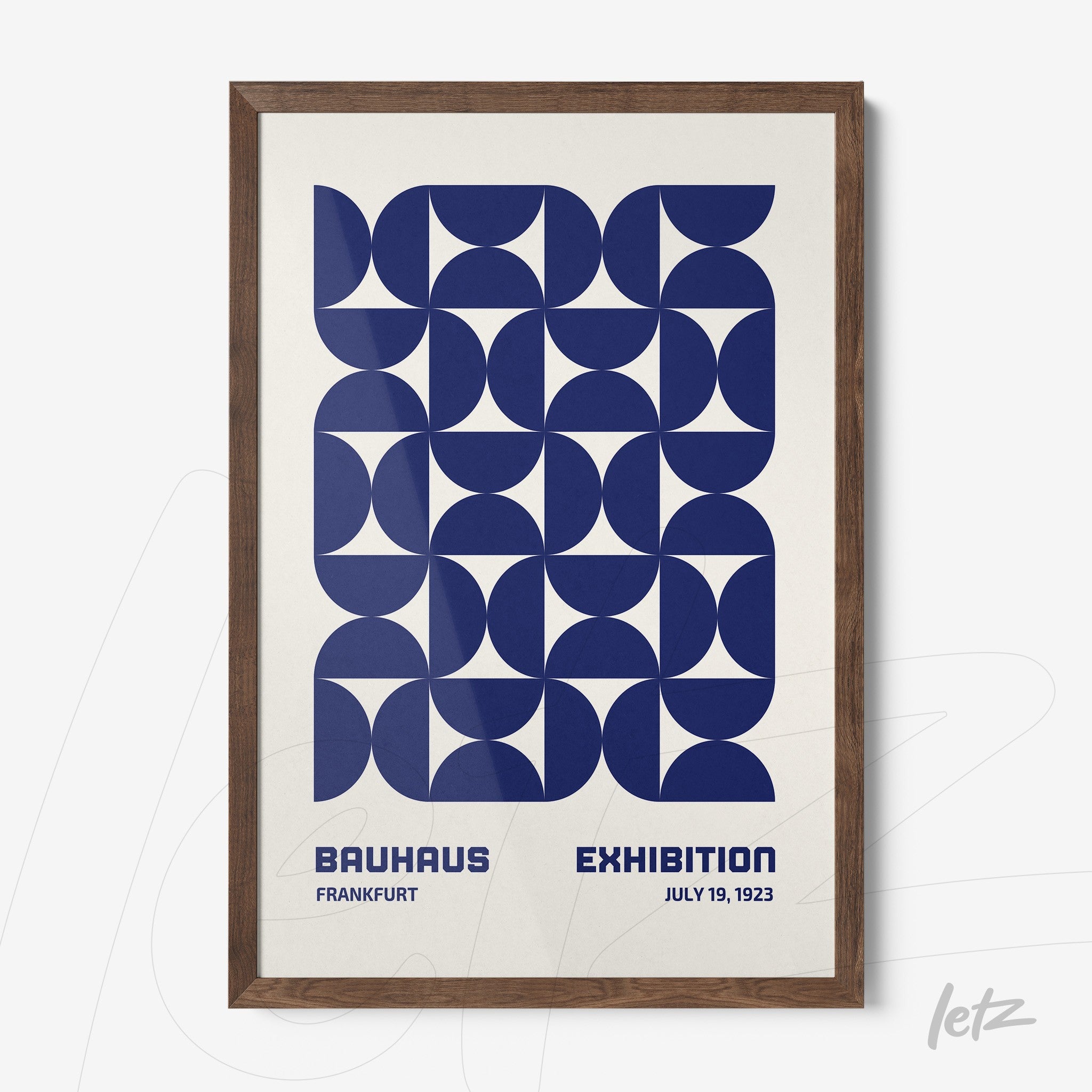 poster featuring bauhaus style geometric design in dark wood frame