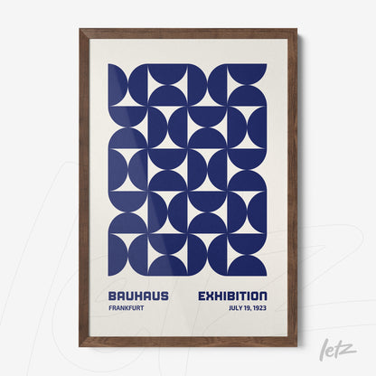 poster featuring bauhaus style geometric design in dark wood frame
