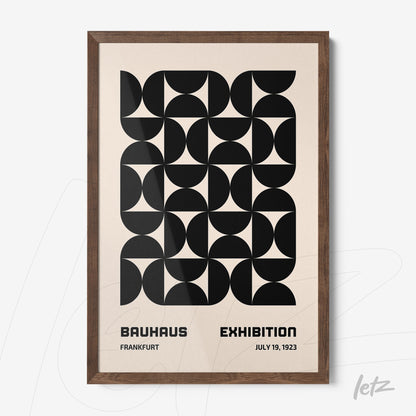 poster featuring black geometric design inspired by Bauhaus school in dark wood frame