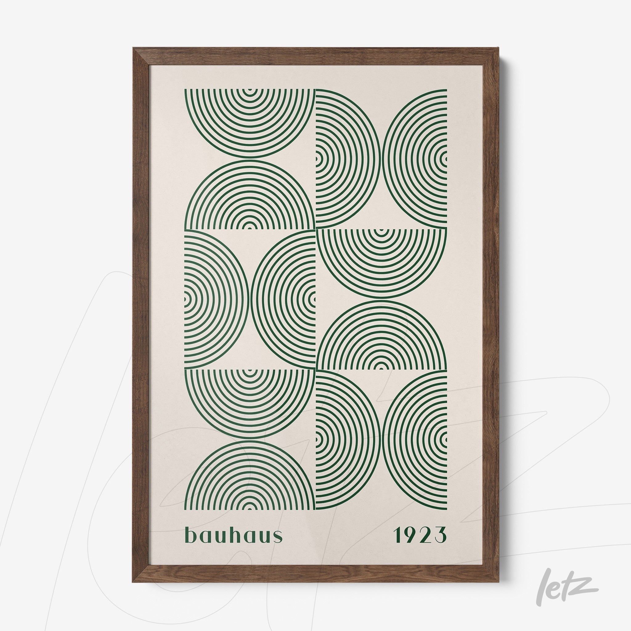 framed geometric bauhaus style illustration with green concentric circles and dark wood frame