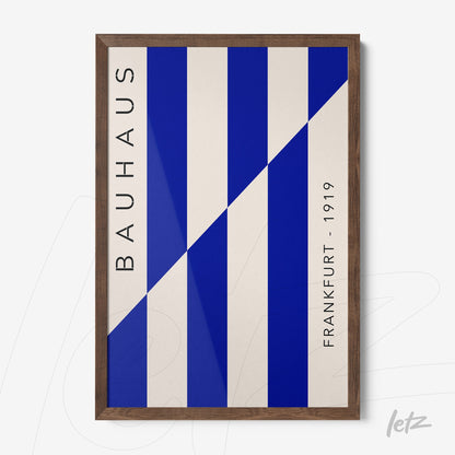 poster featuring blue and white geometric Bauhaus style design in dark wood frame