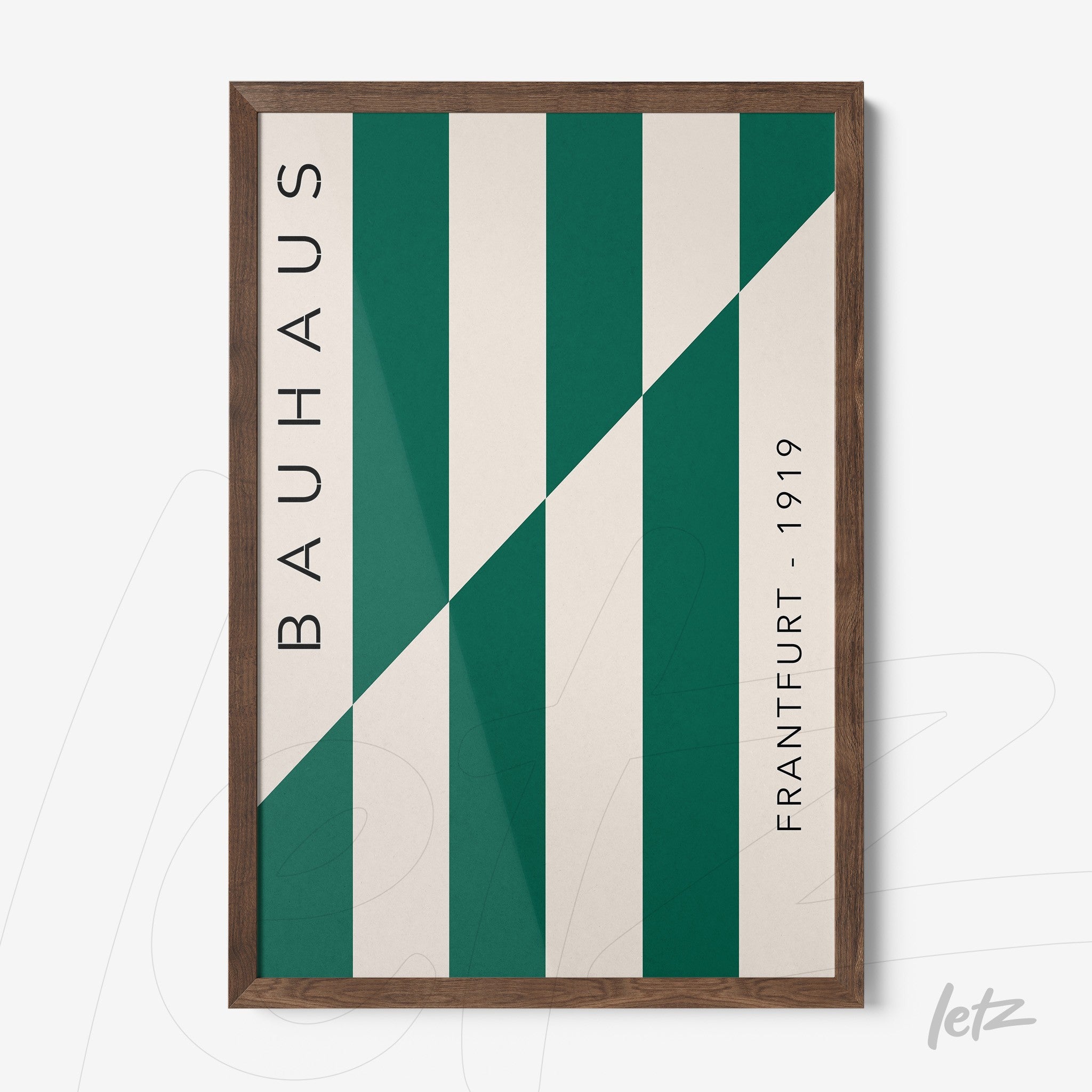 poster with geometric design in green and white, bauhaus style, with dark wooden frame