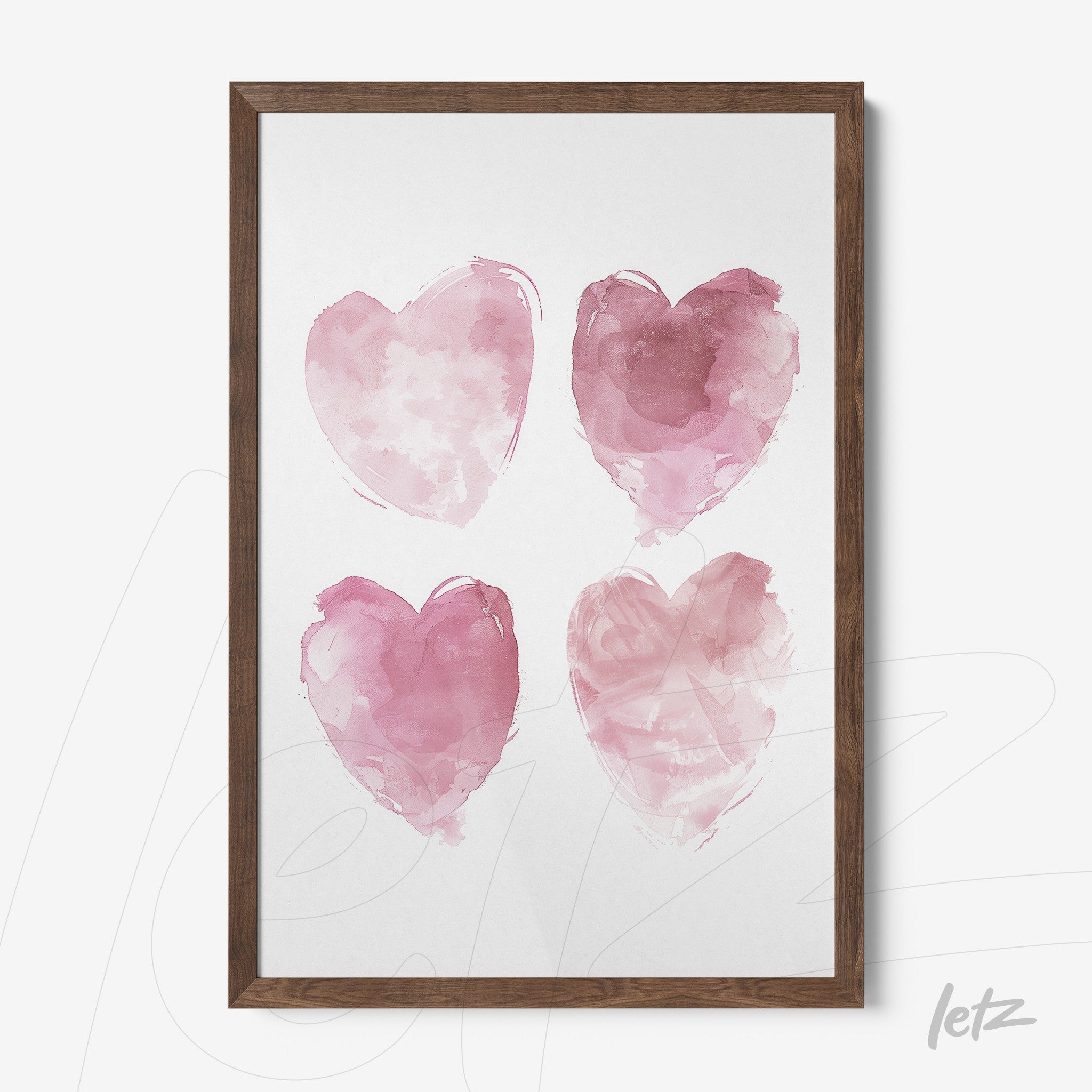 framed art piece featuring soft illustrations of four hearts in light pink shades
