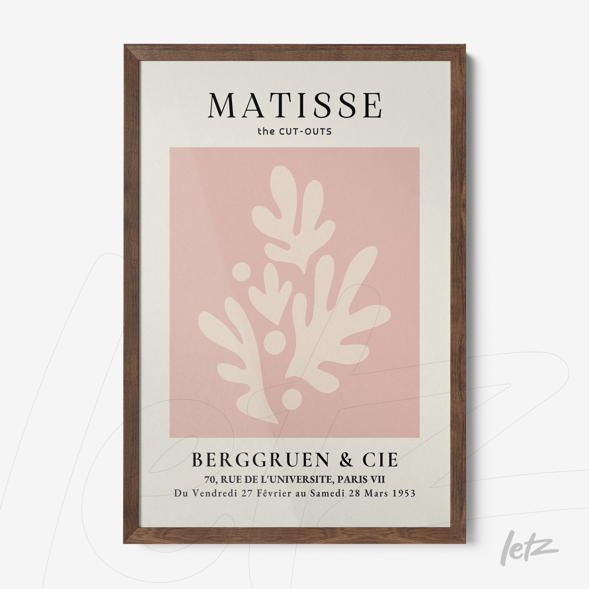 decorative framed art featuring matisse style cut-outs with abstract shapes on soft pink background in dark wood frame