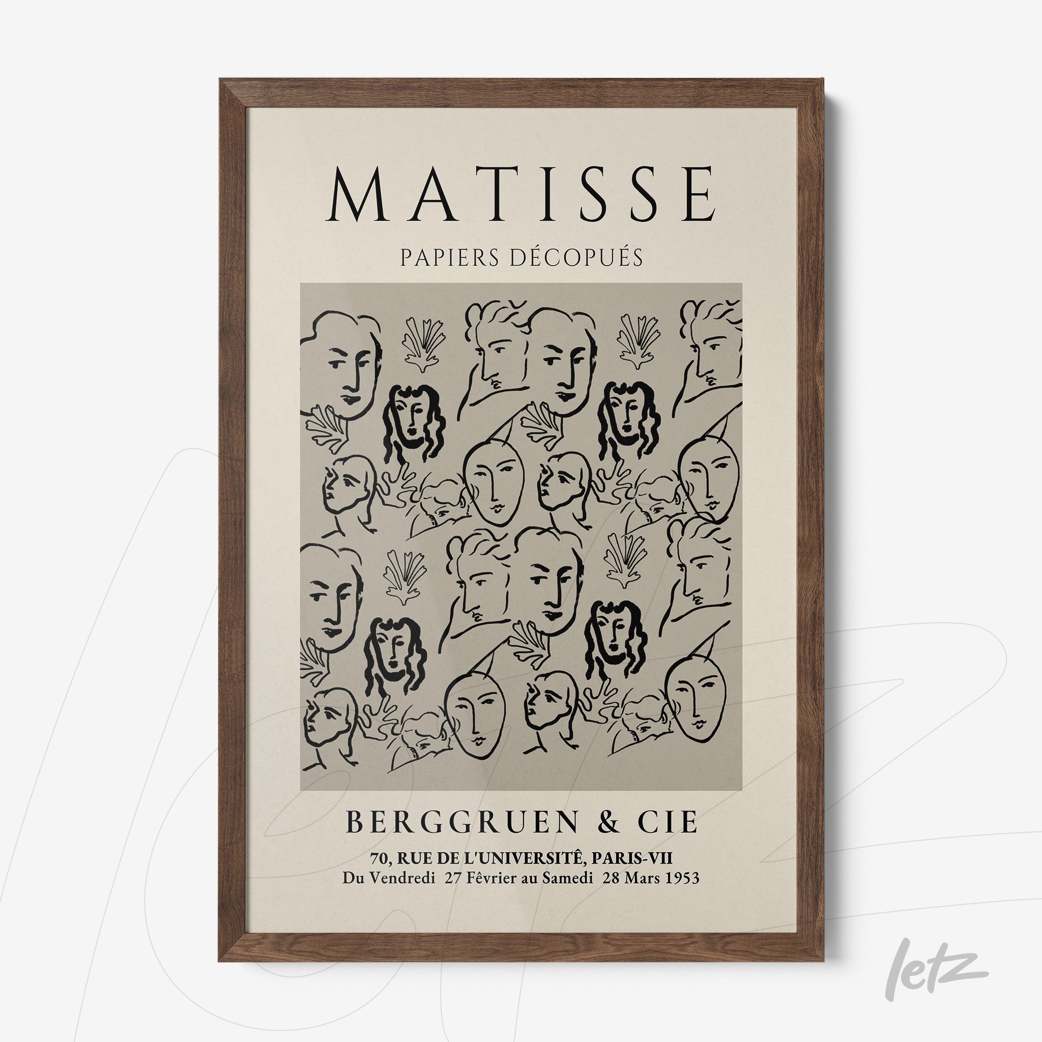 framed wall art featuring modern illustration of faces on light background with dark wood frame
