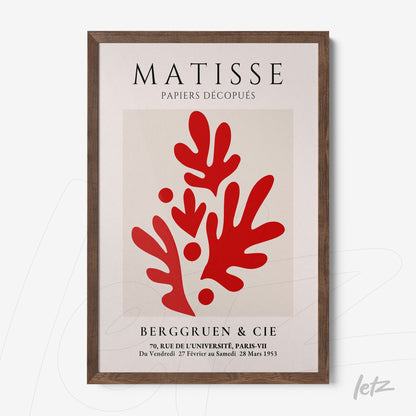 framed wall art inspired by Matisse, featuring abstract red shapes, dark wooden frame