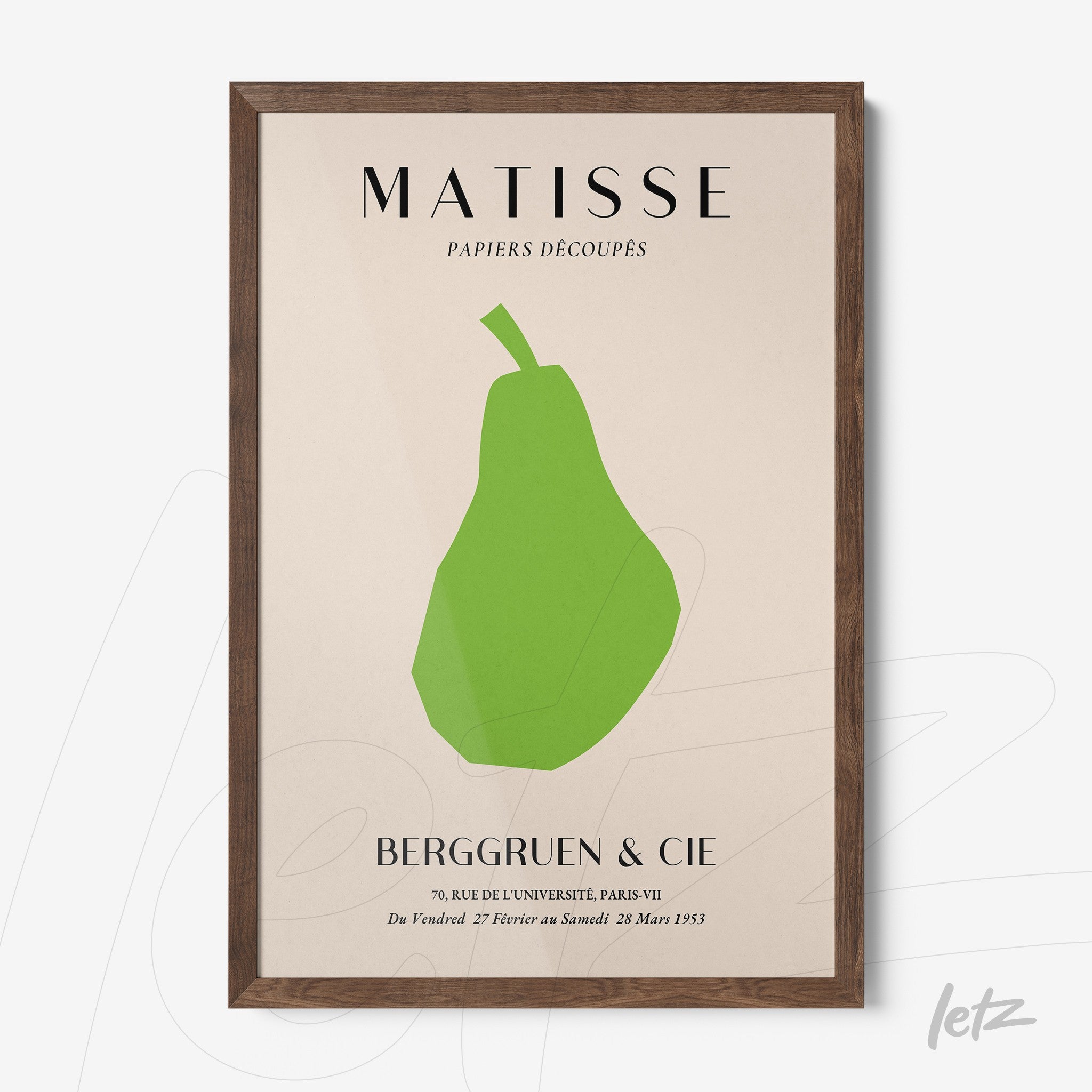 framed wall art featuring a minimalist green pear design on a light background with a dark wood frame