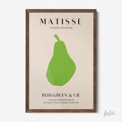framed wall art featuring a minimalist green pear design on a light background with a dark wood frame