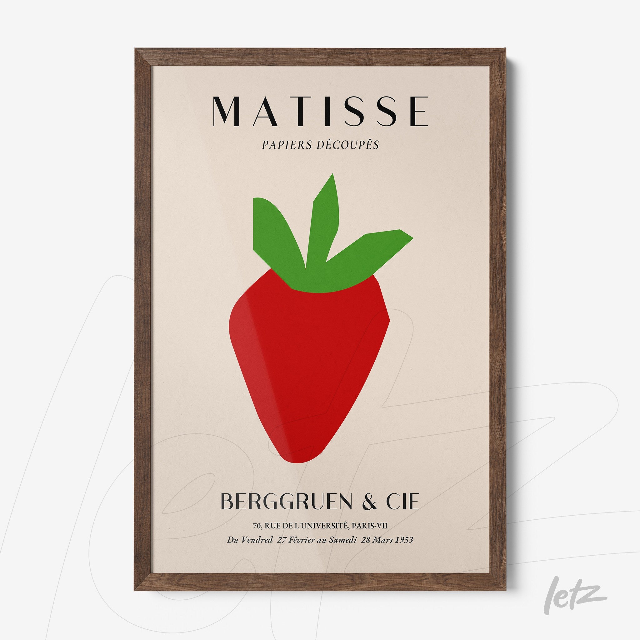framed modern artwork featuring a red strawberry with green leaves set in a dark wood frame