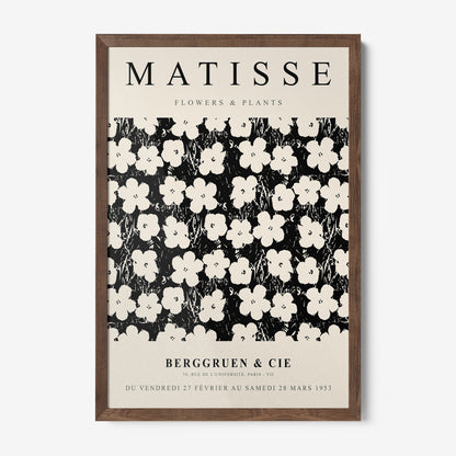 decorative wall art featuring black and white floral design with stylized flowers on dark background and dark wooden frame