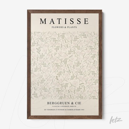 framed wall art featuring delicate floral design in soft colors with dark wooden frame