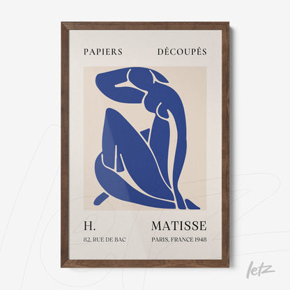 framed modern art print featuring blue shapes against a light background with dark wood frame inspired by Matisse