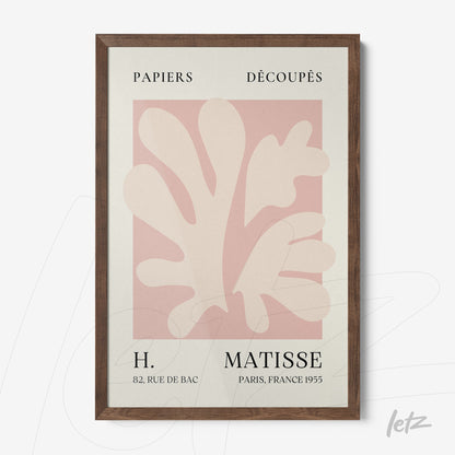 framed wall art featuring modern cut-out design in pastel tones with dark wood frame