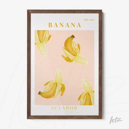 framed wall art featuring banana illustrations on a pink background with dark wood frame