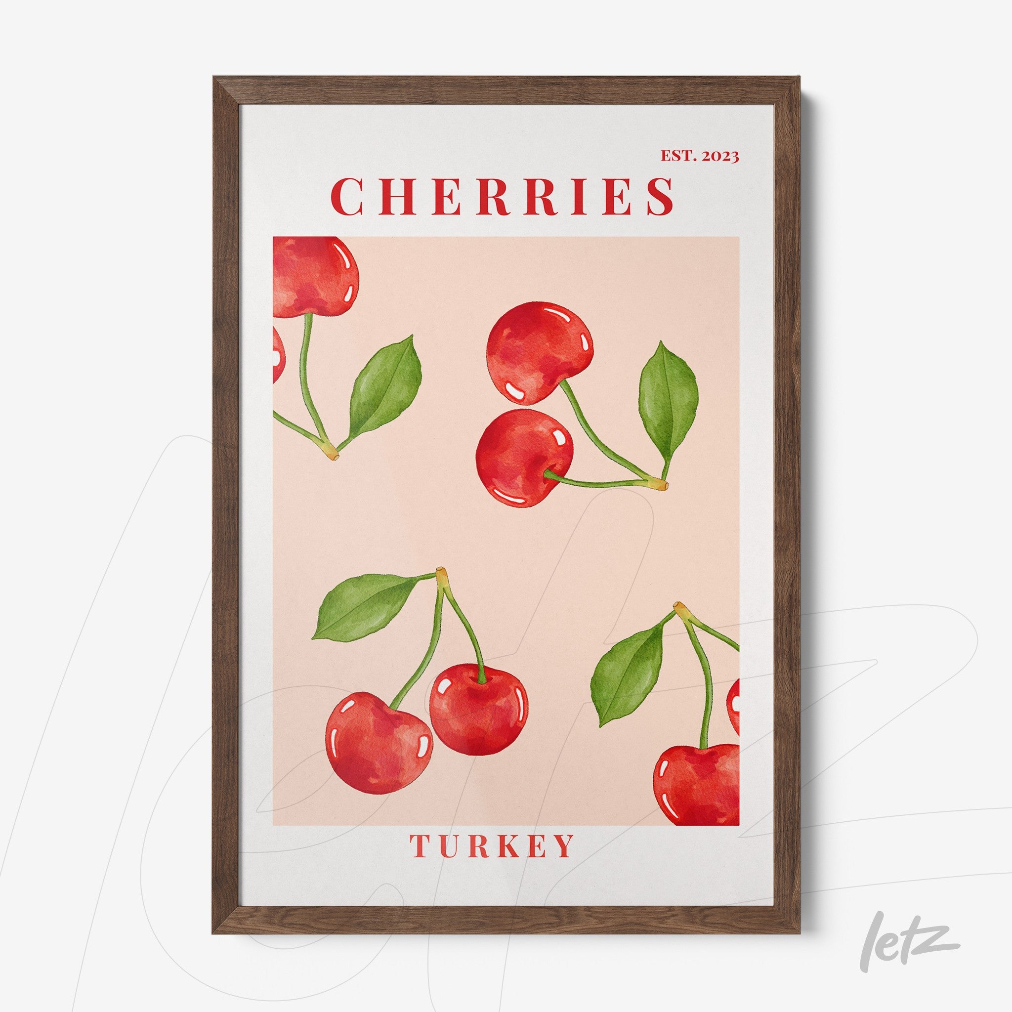 framed art print featuring red cherries on a light pink background with dark wood frame