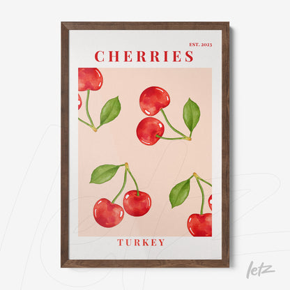 framed art print featuring red cherries on a light pink background with dark wood frame