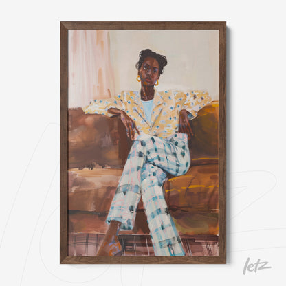 framed portrait of a woman sitting on a sofa, wearing a yellow floral blazer and checkered pants
