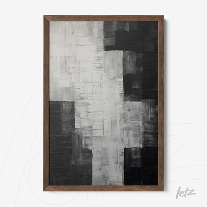 abstract black and white artwork with textured brushstrokes in a dark wood frame