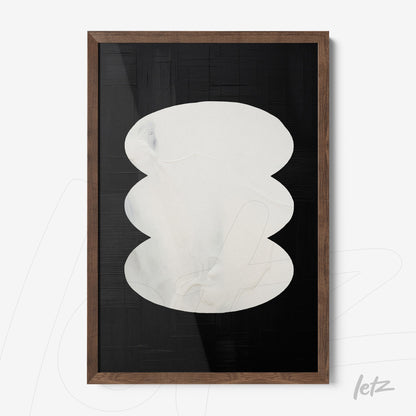 abstract wall art in white and black hues featuring a wooden dark frame