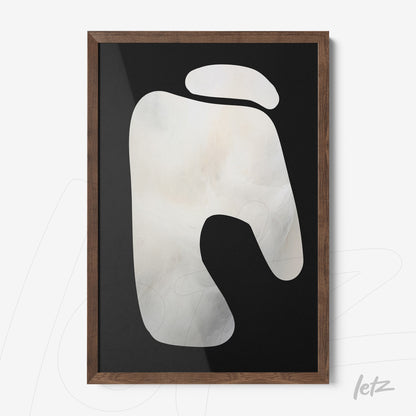 framed wall art with abstract light tones on dark background and dark wood frame