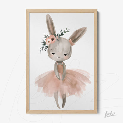 framed art featuring a rabbit wearing a pink tutu and flower crown with light wood frame