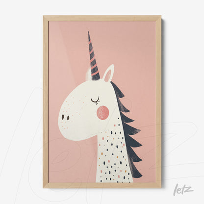 framed artwork featuring a unicorn illustration on pink background with light wood frame