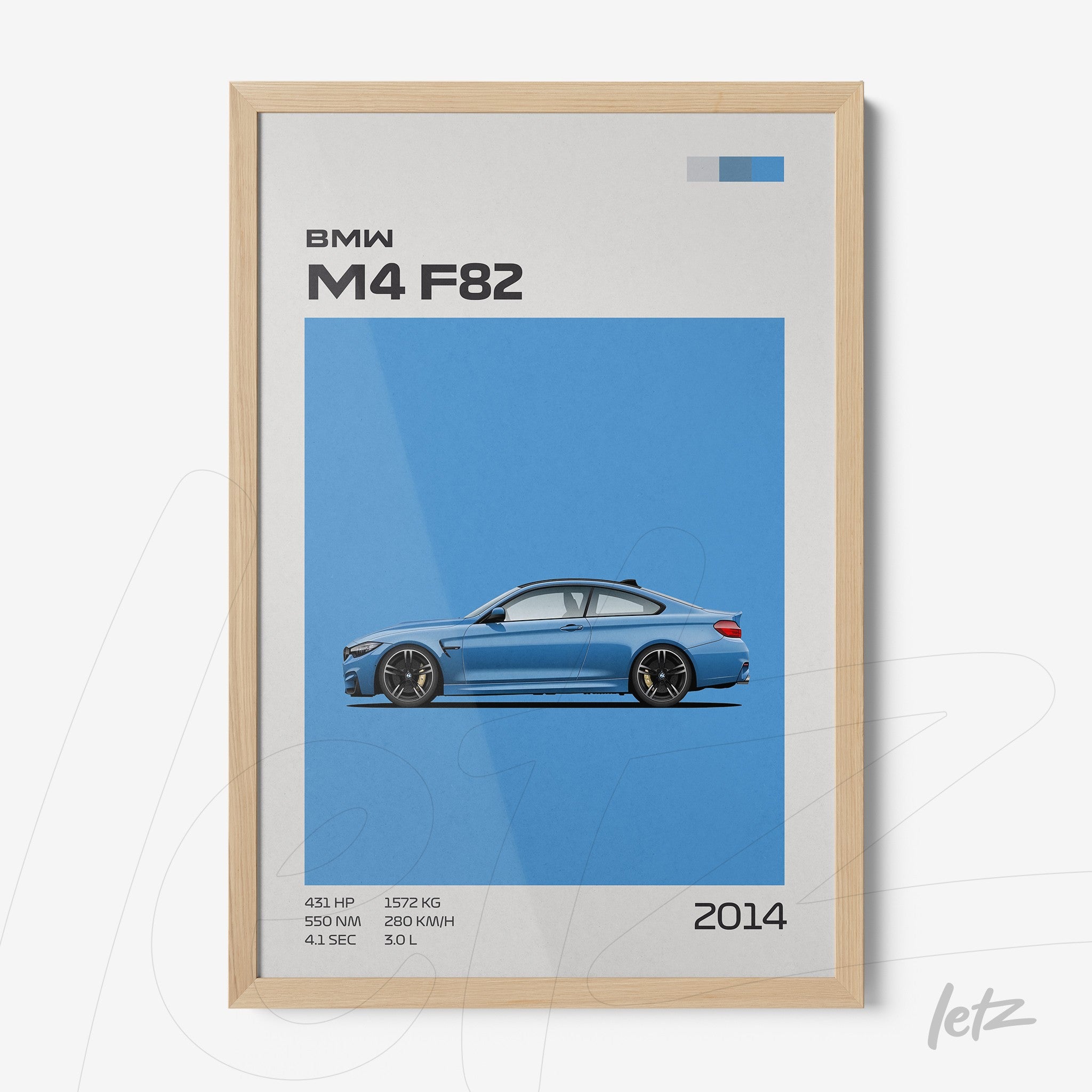framed artwork of the BMW M4 F82 car in light wood frame with blue background
