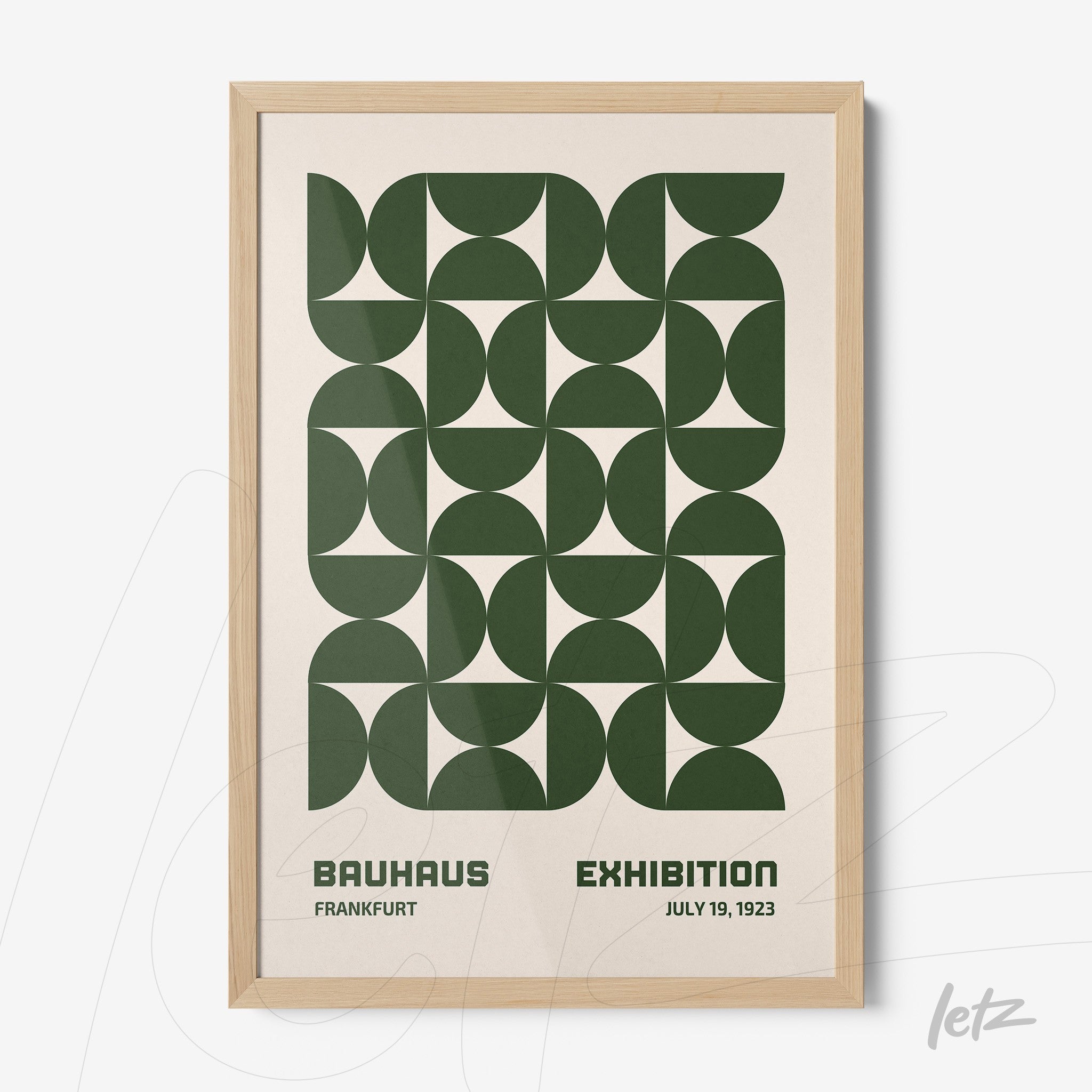 abstract Bauhaus style poster with geometric green pattern in light wood frame