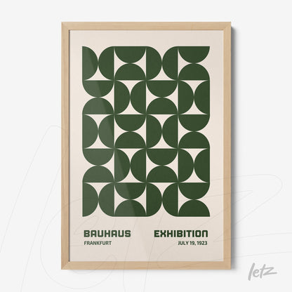 abstract Bauhaus style poster with geometric green pattern in light wood frame