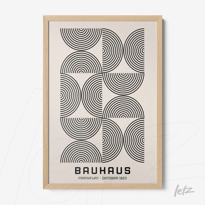 poster print featuring black and white geometric art of concentric semicircles framed in light wood