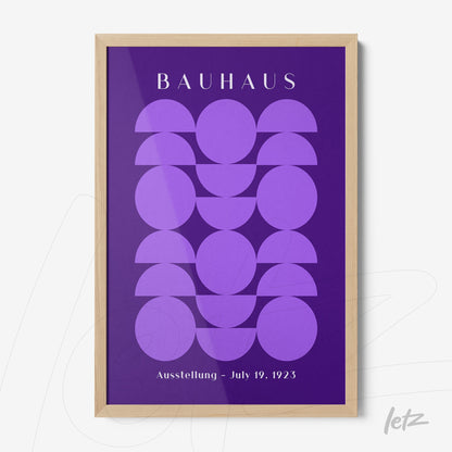 bauhaus style geometric purple shapes in light wood frame