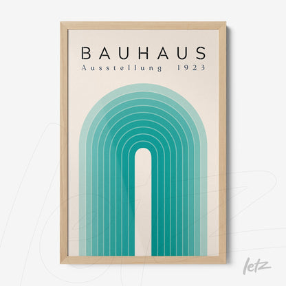 poster with geometric art in blue and green tones with the inscription bauhaus ausstellung 1923 in a light wood frame