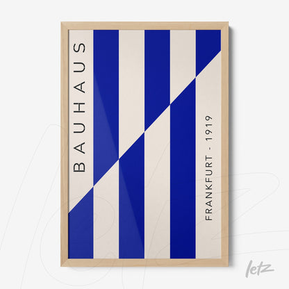 poster with geometric art in blue and white with light wood frame and vertical text reading bauhaus frankfurt 1919