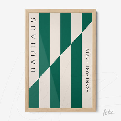 bauhaus style art with green diagonal stripes in light wood frame