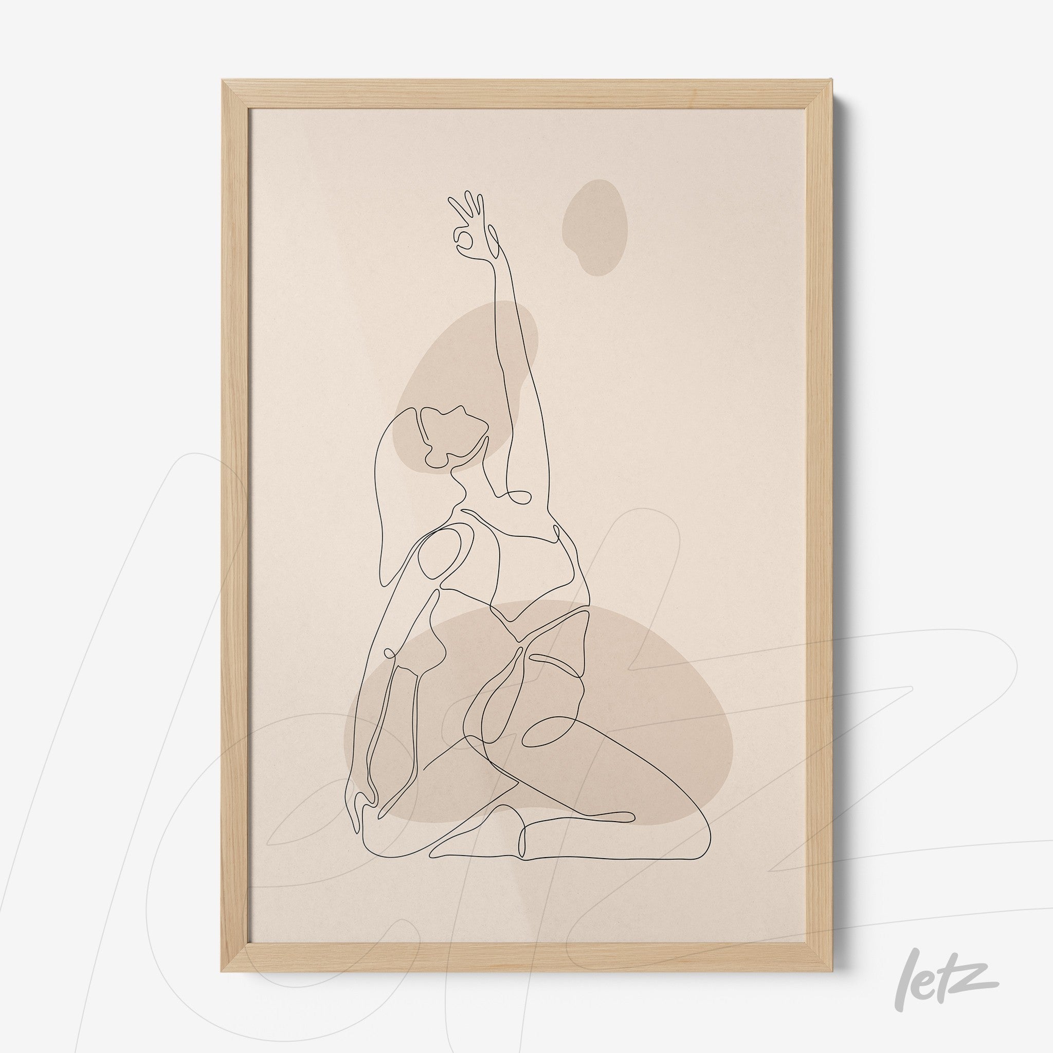 framed line art of woman in yoga pose in light wood frame