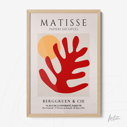 decorative wall art featuring abstract design in red and yellow tones, light wood frame with Matisse inspired artwork
