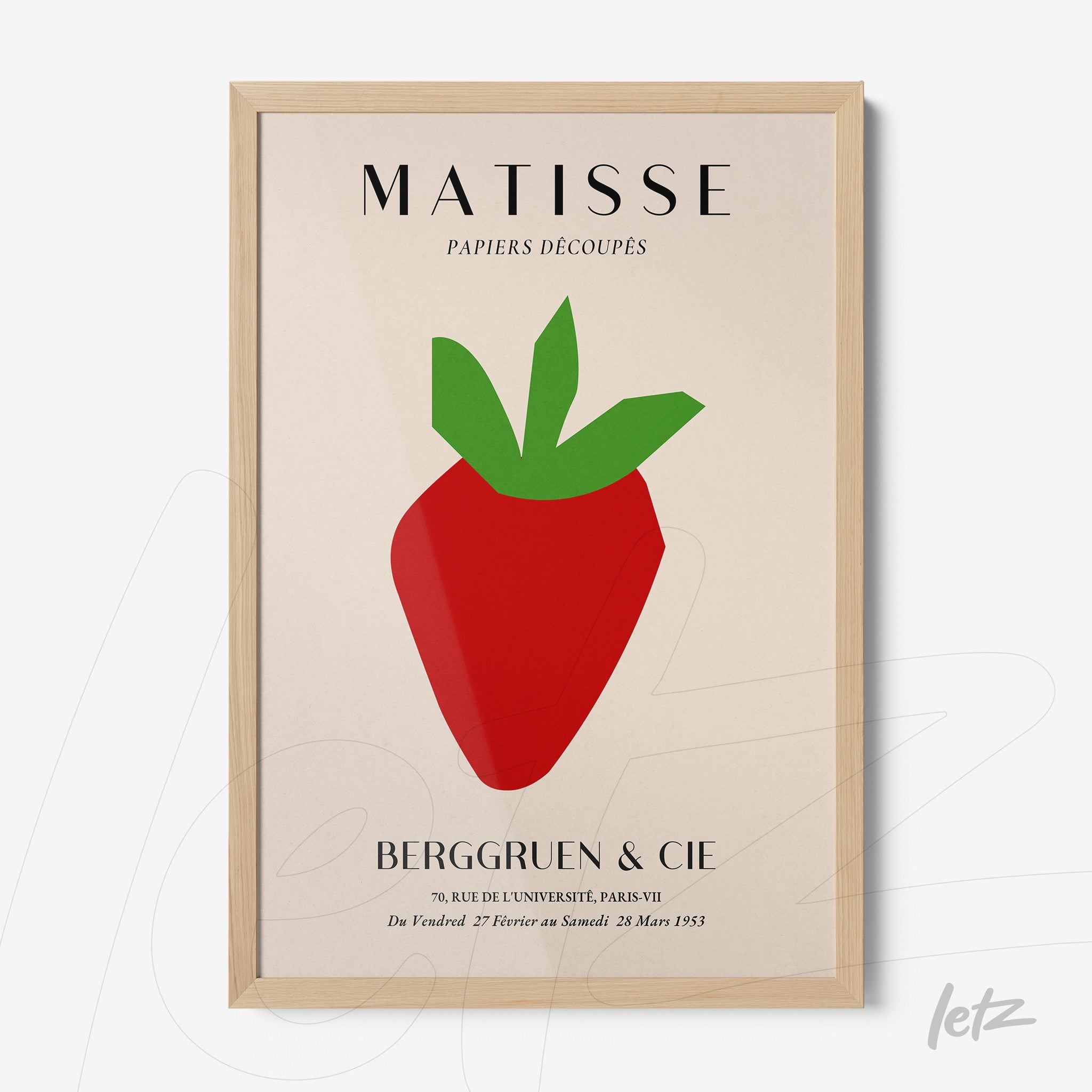 framed wall art featuring a stylized strawberry in vibrant colors with a light wood frame and neutral background