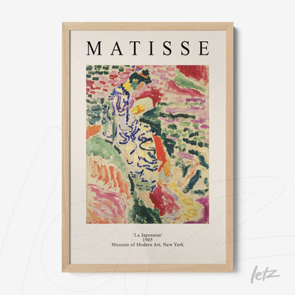 framed wall art featuring fauvist style painting of a female figure in vibrant colors with light wooden frame and 'MATISSE' text