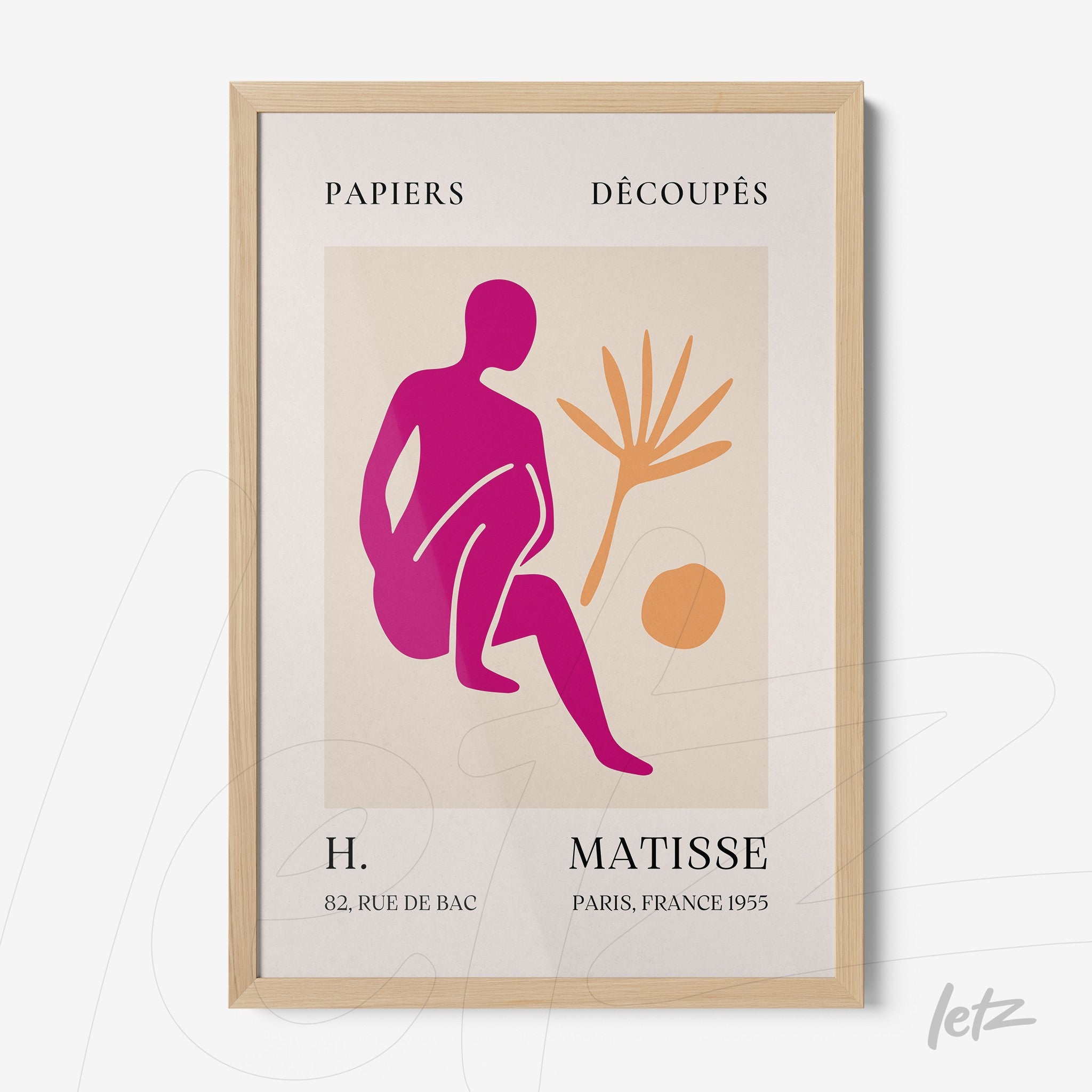 framed art print in the style of Matisse featuring colorful cut-outs of a human figure in pink and orange against a light background with a light wood frame